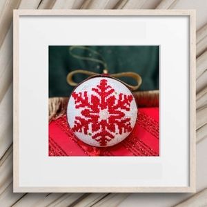 New Year's toy for the Christmas tree is made by hand with embroidery. Ornaments
